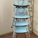 4 blue Formica chairs