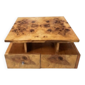 An Art Deco coffee table made of beech wood and elm burl with drawers.