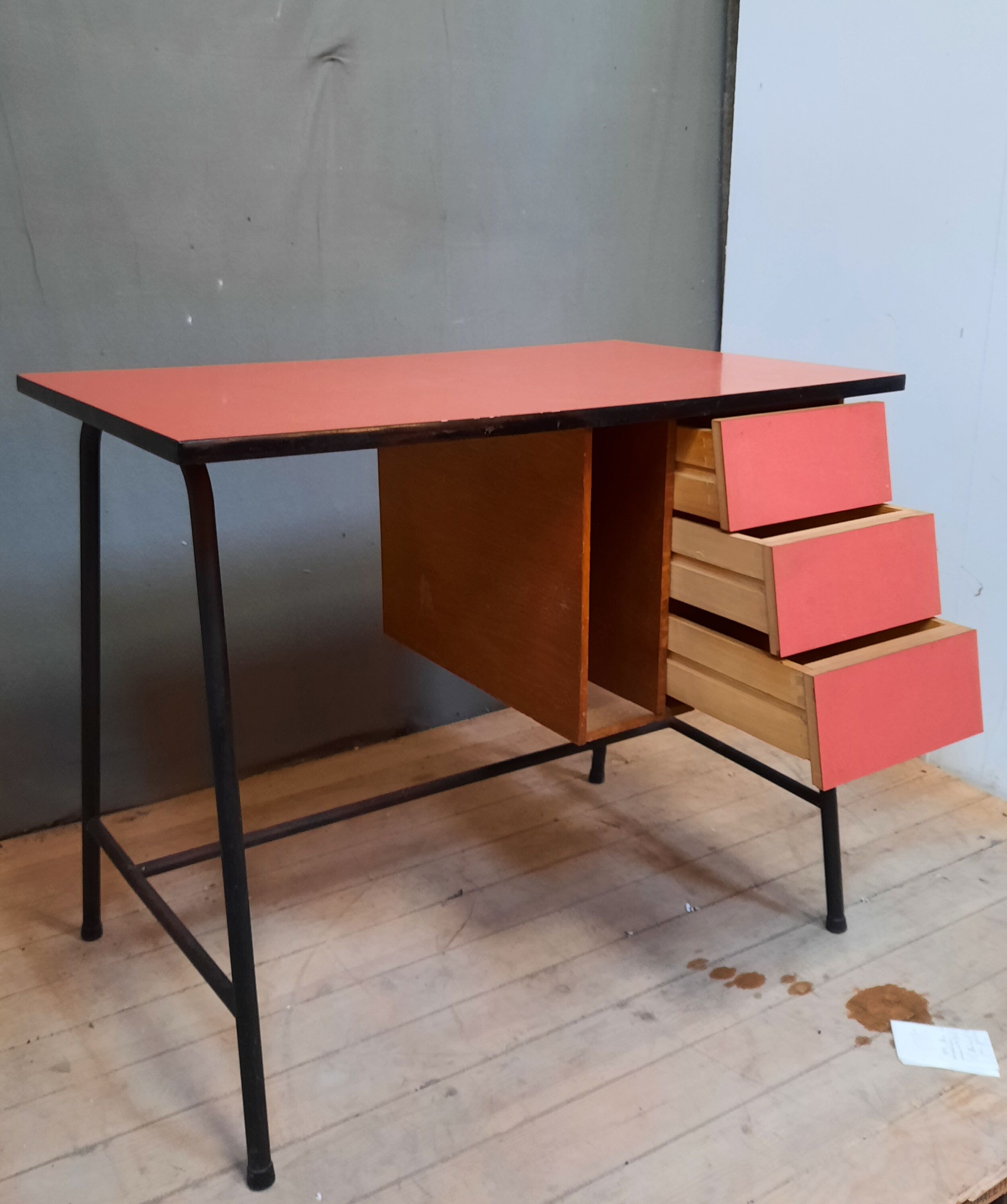 Red vintage desk and its chair
