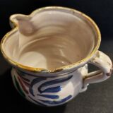 Old earthenware pitcher late 19th century