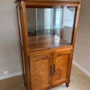 Louis XV style display cabinet, glass doors and chevron panels.