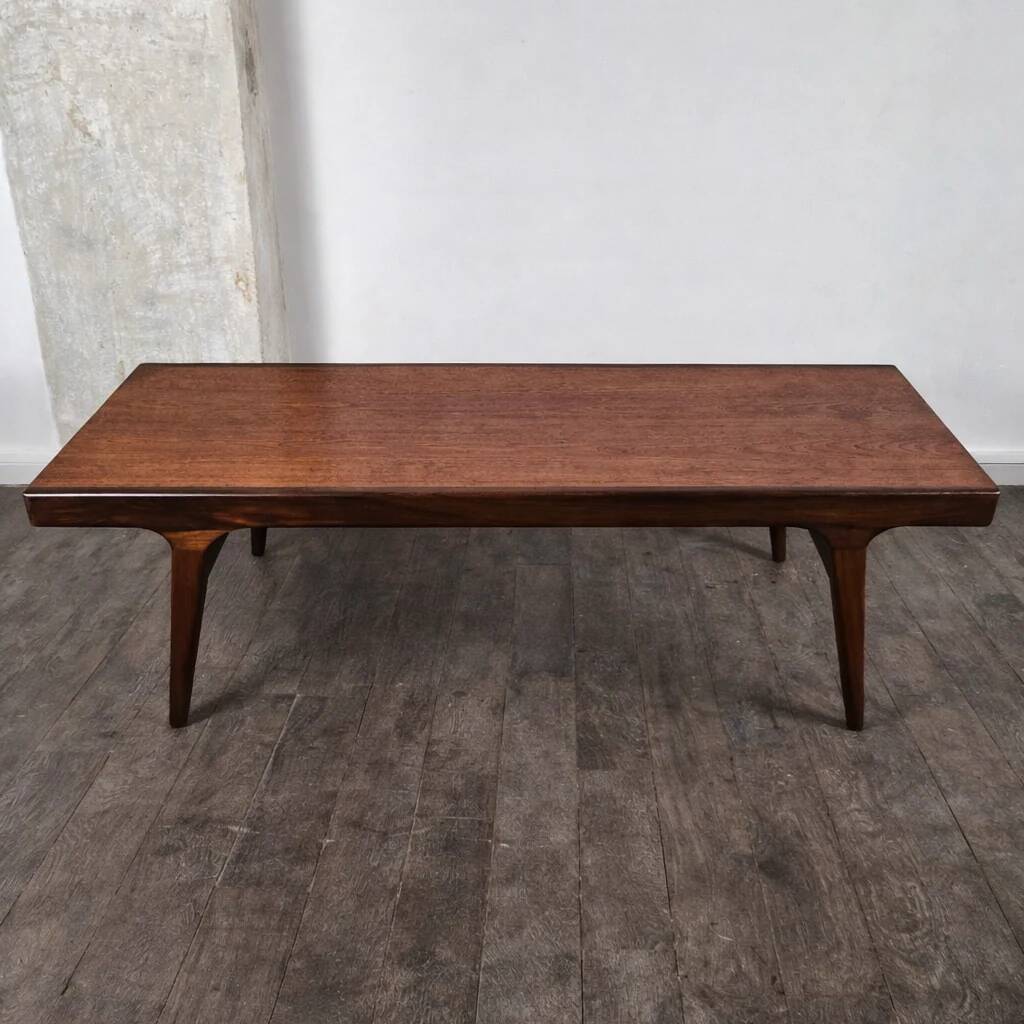Teak coffee table with opening and drawer by Johannes Andersen for Uldum Møbelfabrik, Denmark, 1960.