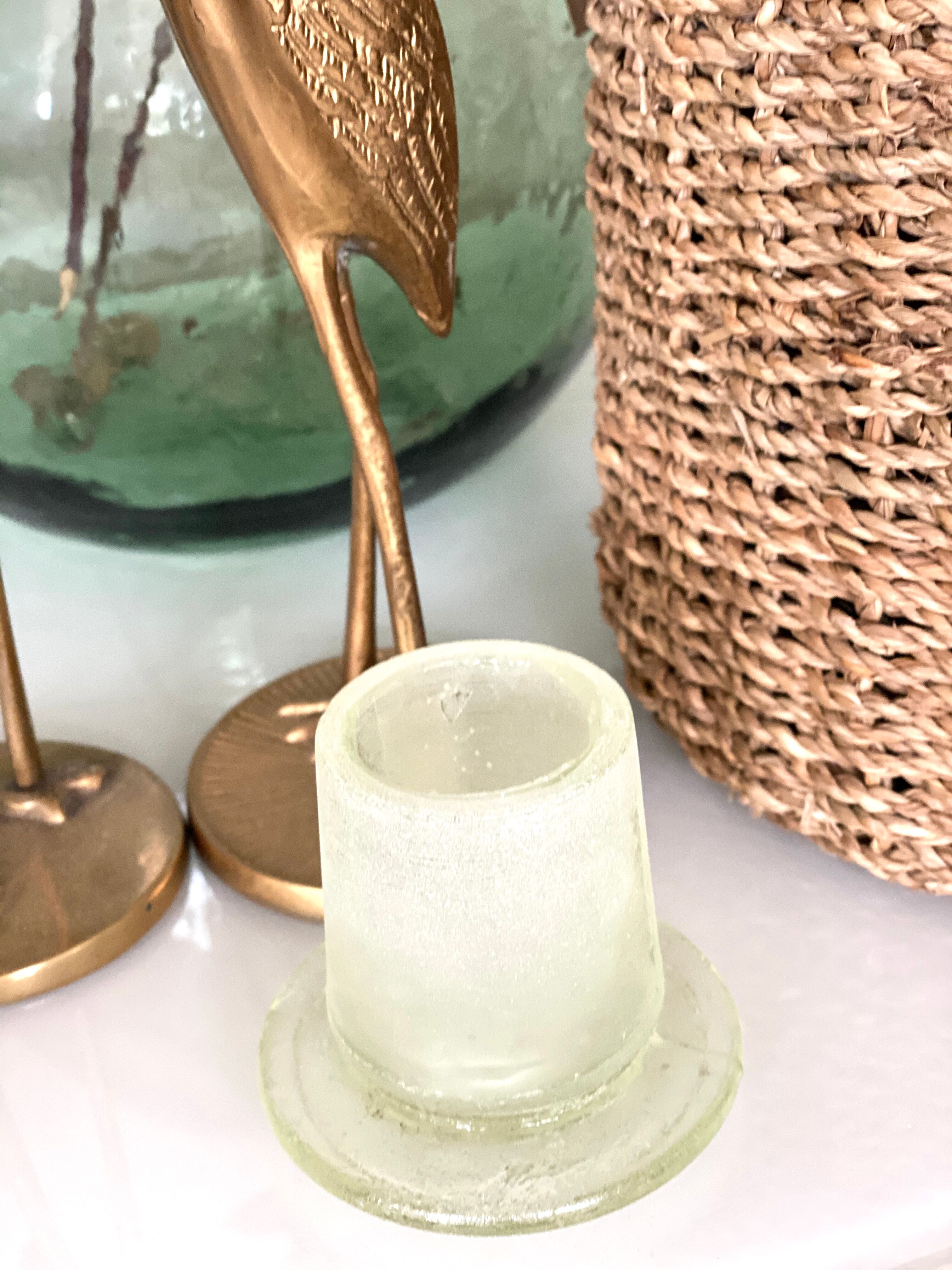 Glass bottle and braided rope