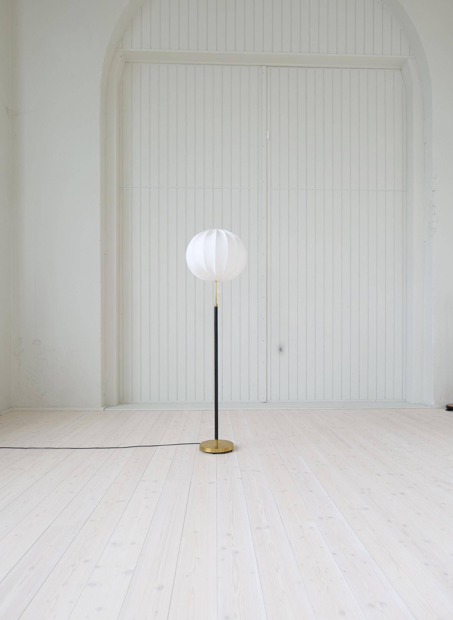 Mid-century black leather floor lamp by Falkenbergs Belysning, Sweden, 1960s.