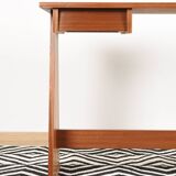 Elegant small teak desk, with drawer, 1960s.