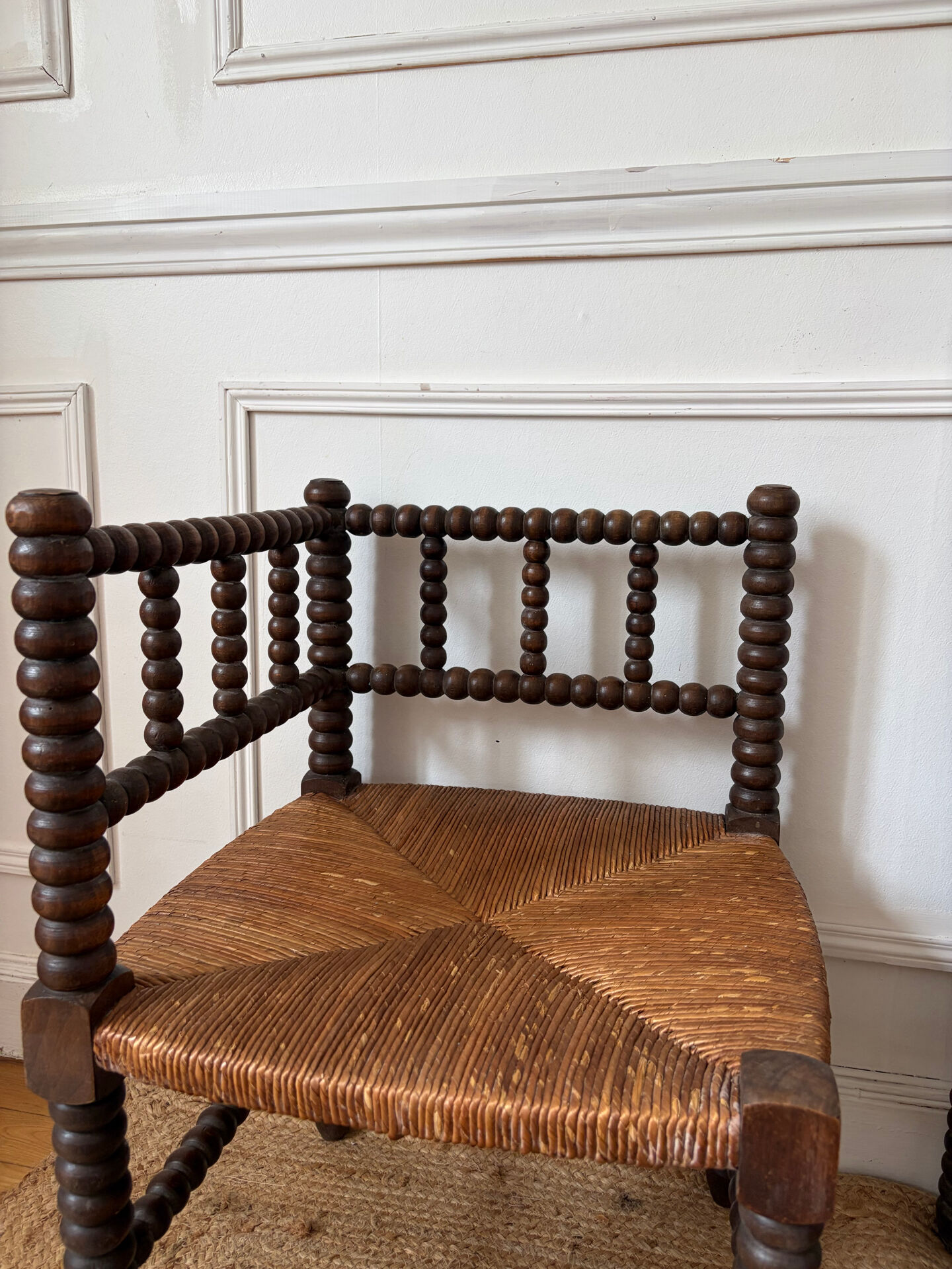 Pair of rush-seated chairs by the fireside "bobbin"