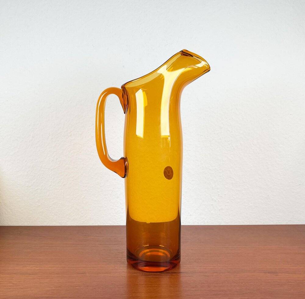 Amber glass carafe from the mid-century German Jagdhaus series and drinking glasses by Wilhelm Braun-Feldweg for Hirschberg, 1960s, set of 7.
