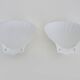 Pair of shell wall lights, in white ceramic. 80s 90s