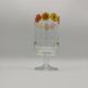 Vintage stemmed glass with floral decoration