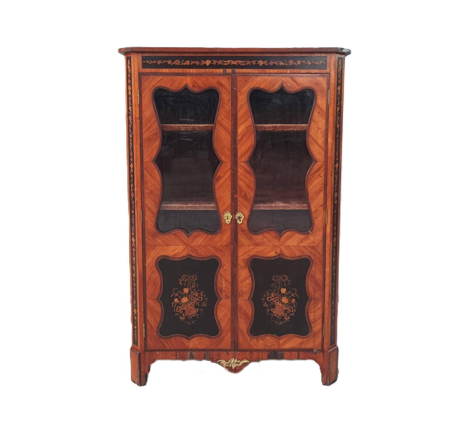 Louis XVI glass-fronted library in rosewood and amaranth veneer.