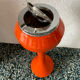 1970's Italian ashtray in mandarin orange plastic with its Space Age tulip foot