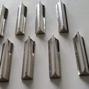Huit porte-couteaux Boulenger en métal argenté art déco