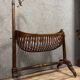 Empire style mahogany cradle with a swan neck, shaped like a cradle, circa 1810