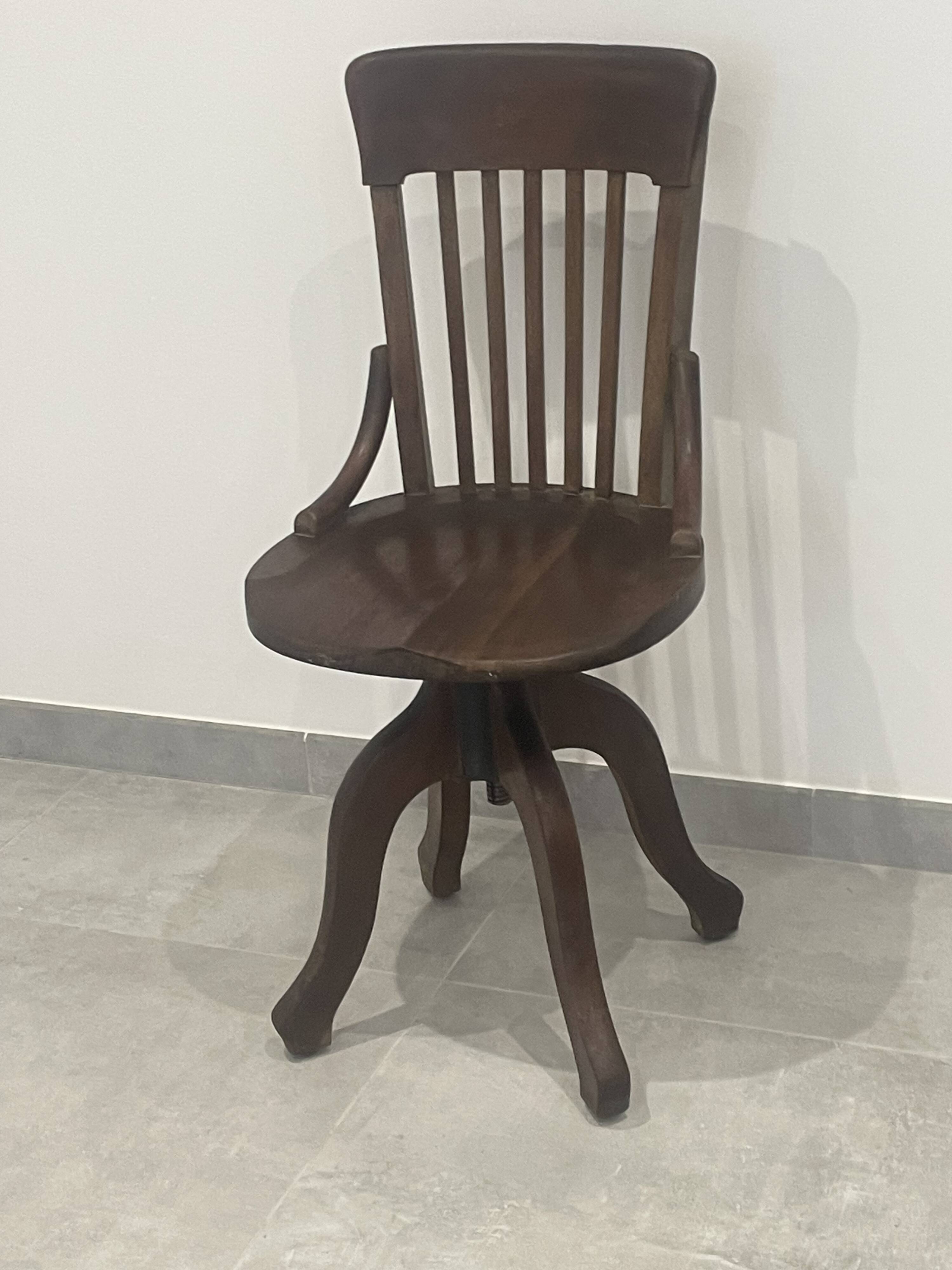 Baumann 1920 rotating office chair with adjustment screw