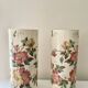 Roller vases in earthenware with floral decoration of wild rose, circa 1930–1950.
