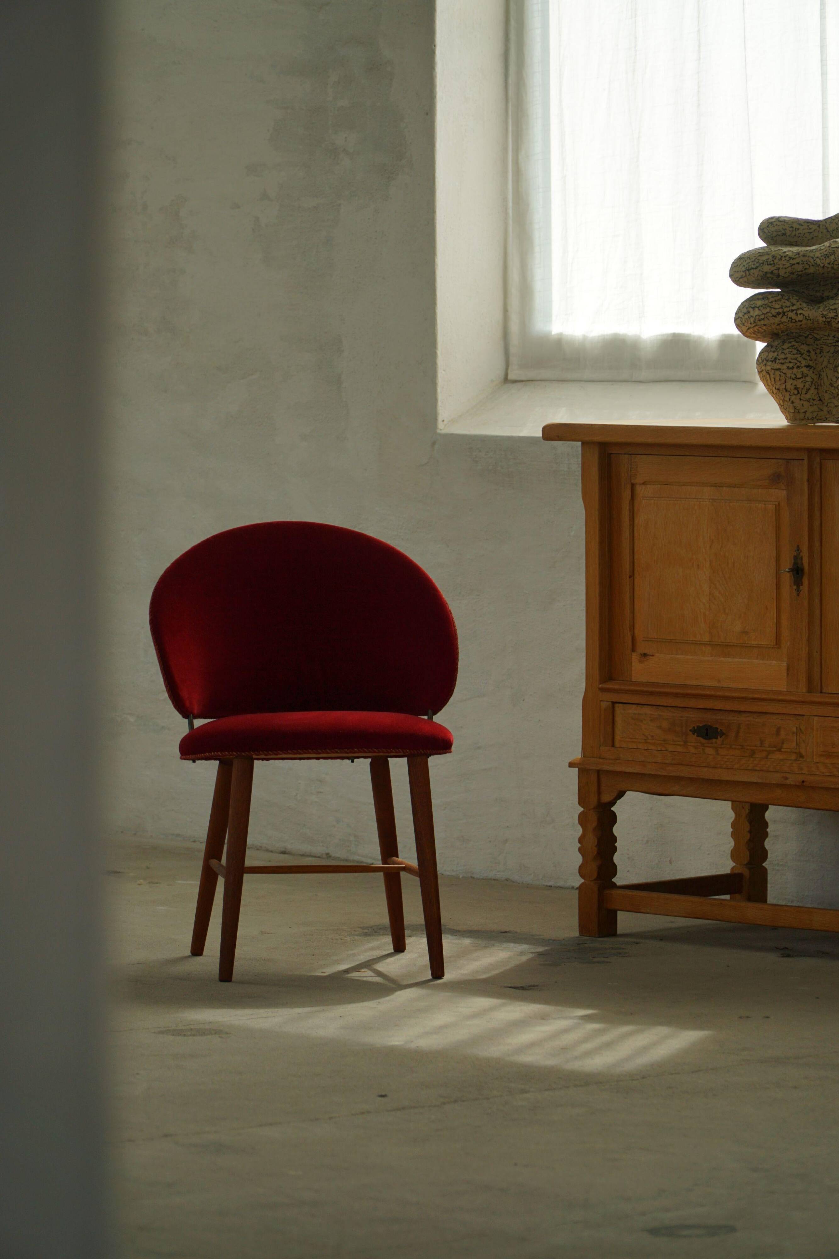 Mid-century toilet chair in oak and red velvet, by a Danish cabinetmaker, 1950s.