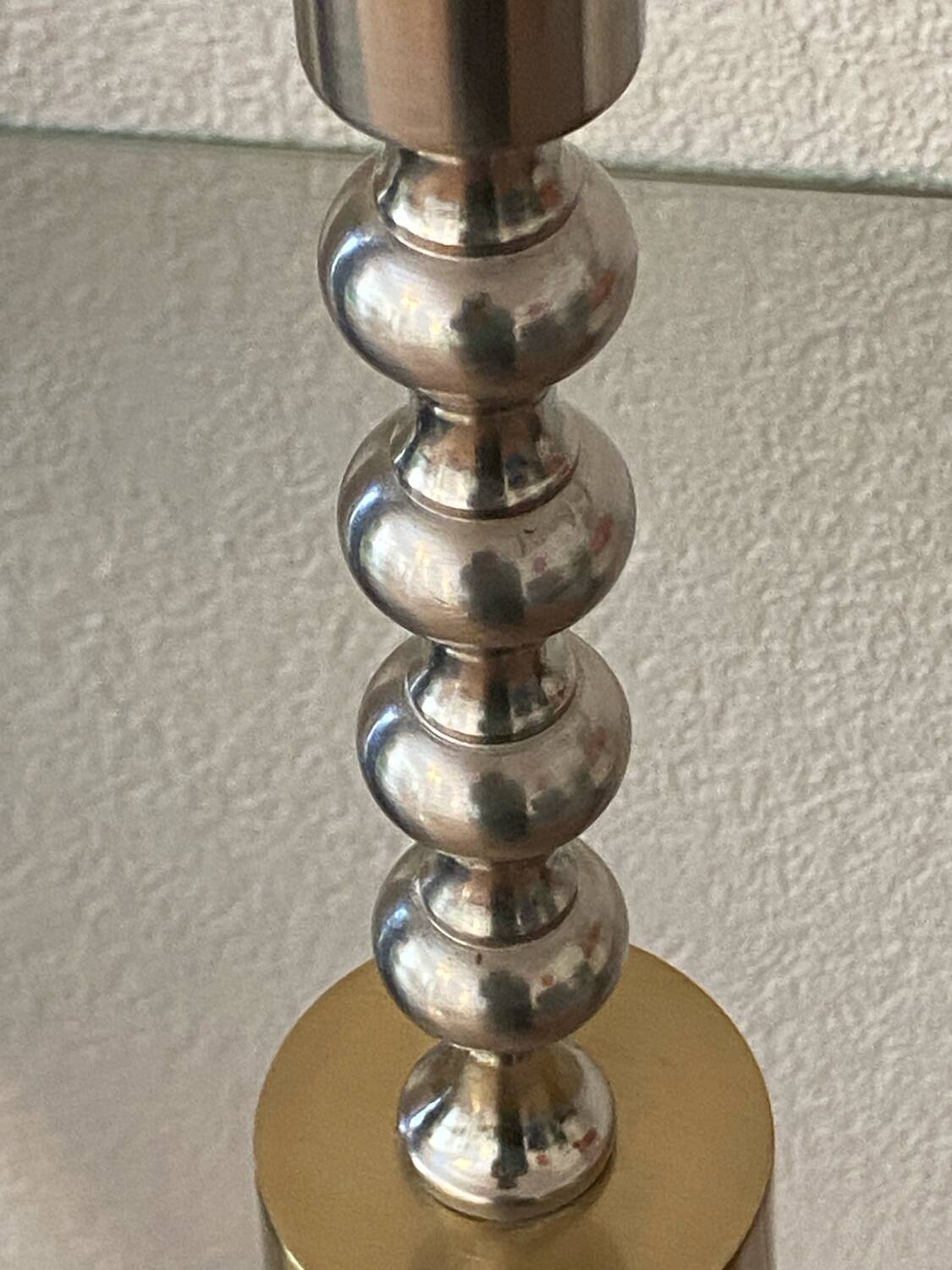 Silver and gold metal candle holder