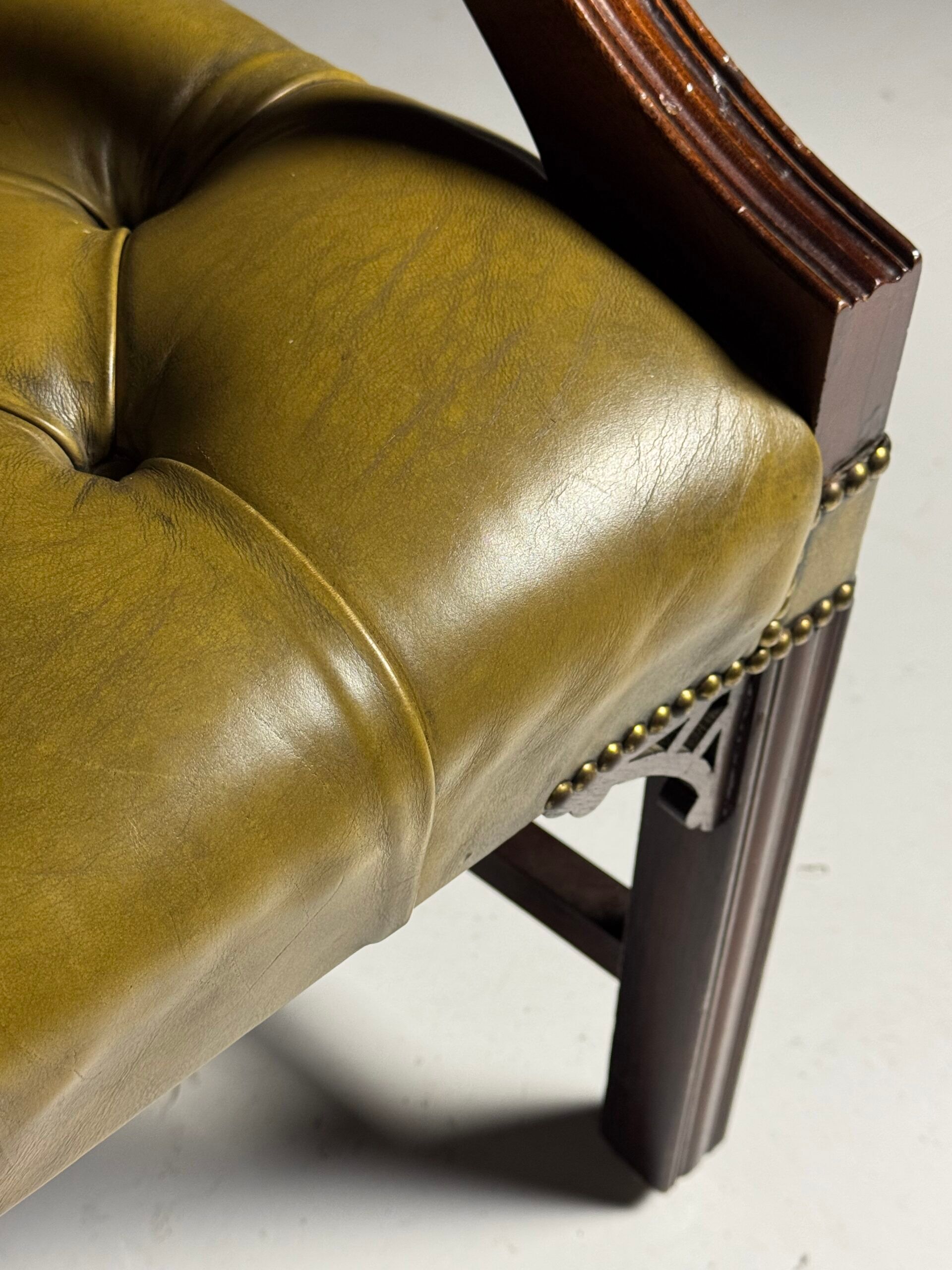Green leather tufted office chair