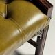 Green leather tufted office chair