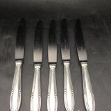 9 table knives in silver metal.