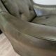Dark green vintage leather armchair: 1970s Scandinavian style