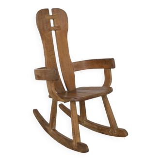 Fauteuil à bascule brutaliste en chêne massif par De Puydt, années 1970