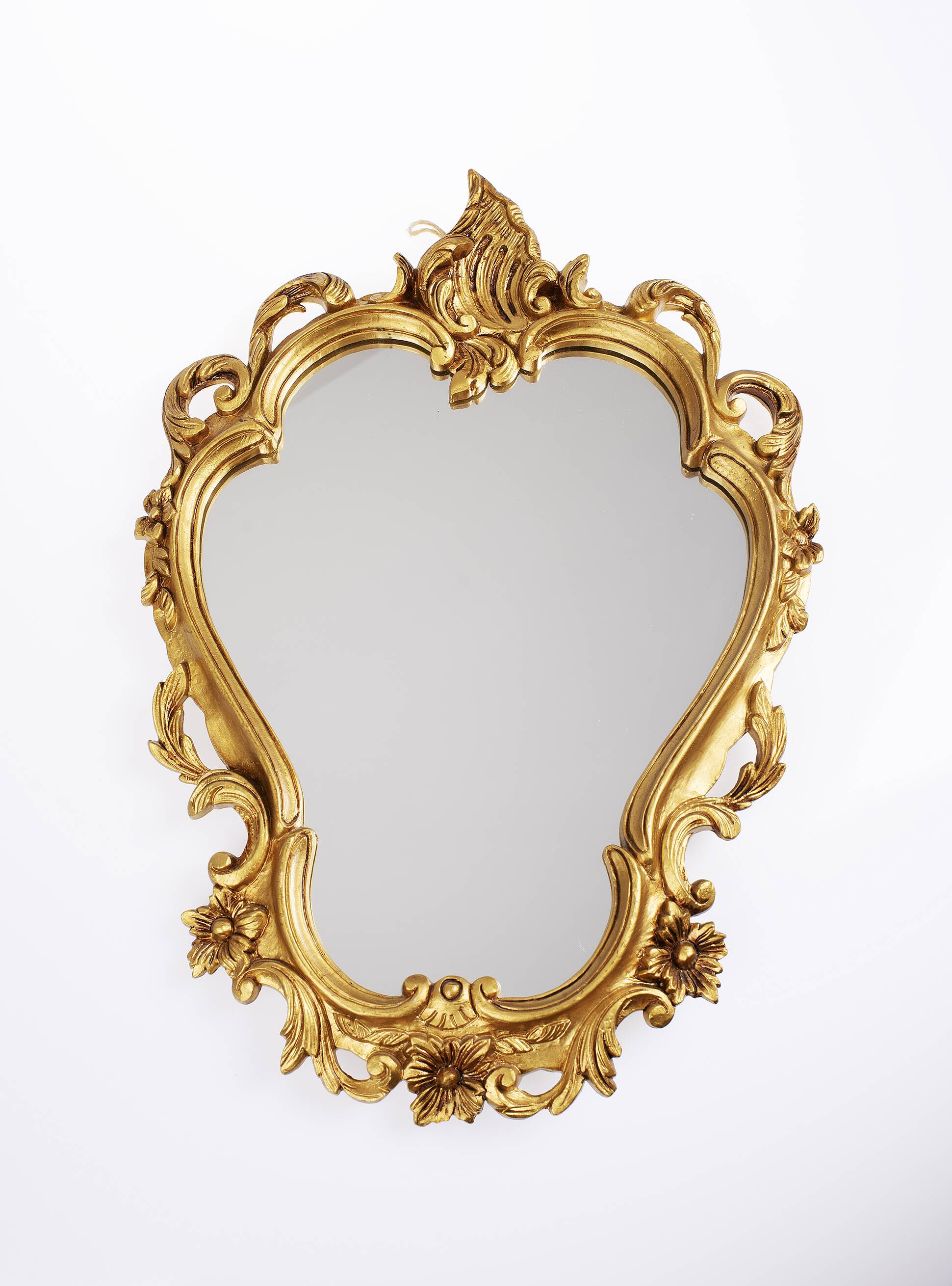 Baroque mirror in golden resin