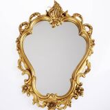 Baroque mirror in golden resin