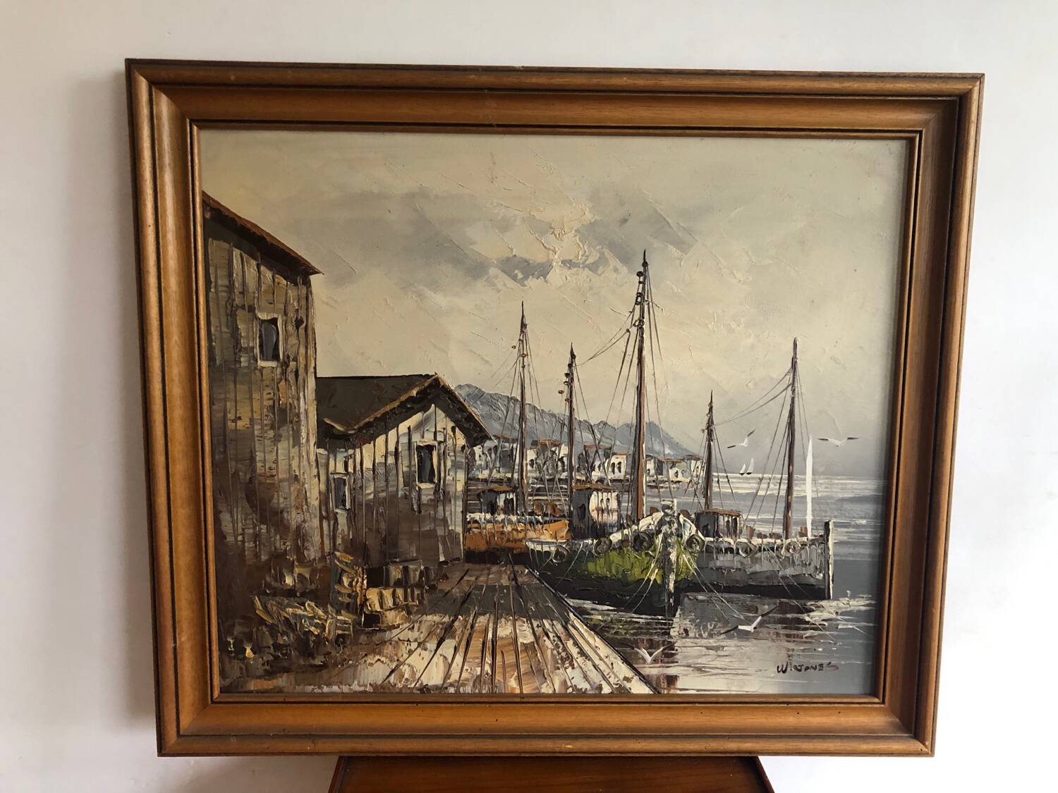 Marine painting boats in port