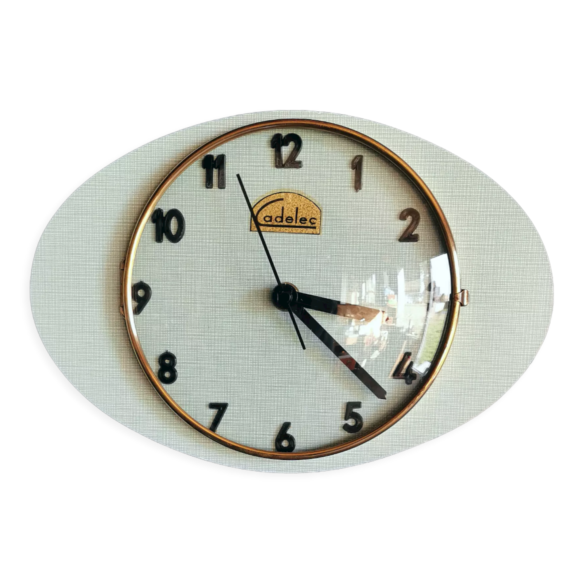 Vintage formica clock oval silent wall clock "Cadelec blue"