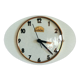Horloge formica vintage pendule murale silencieuse ovale "Cadelec bleu"