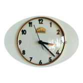 Horloge formica vintage pendule murale silencieuse ovale "Cadelec bleu"