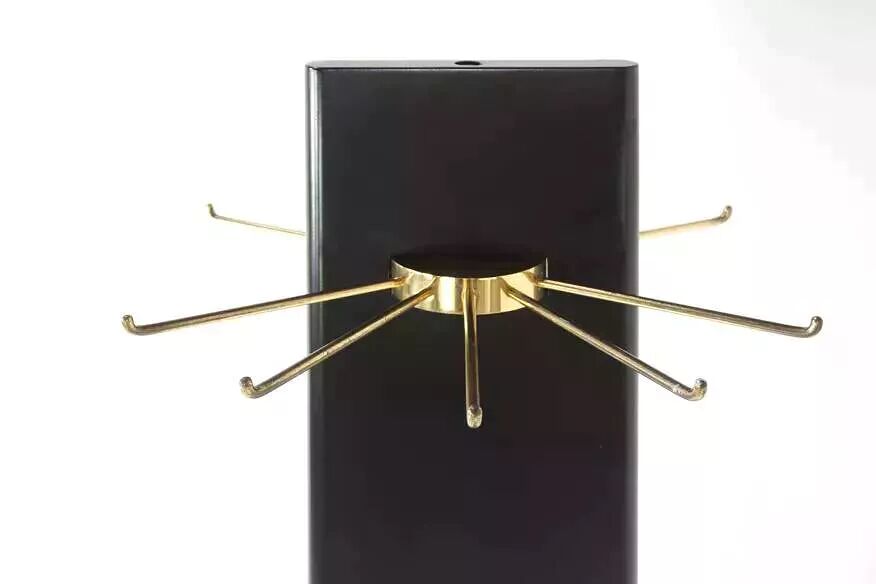Swivel coat rack in black lacquered wood and brass