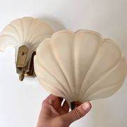Pair of vintage shell glass wall lights, Art Deco style fixtures.