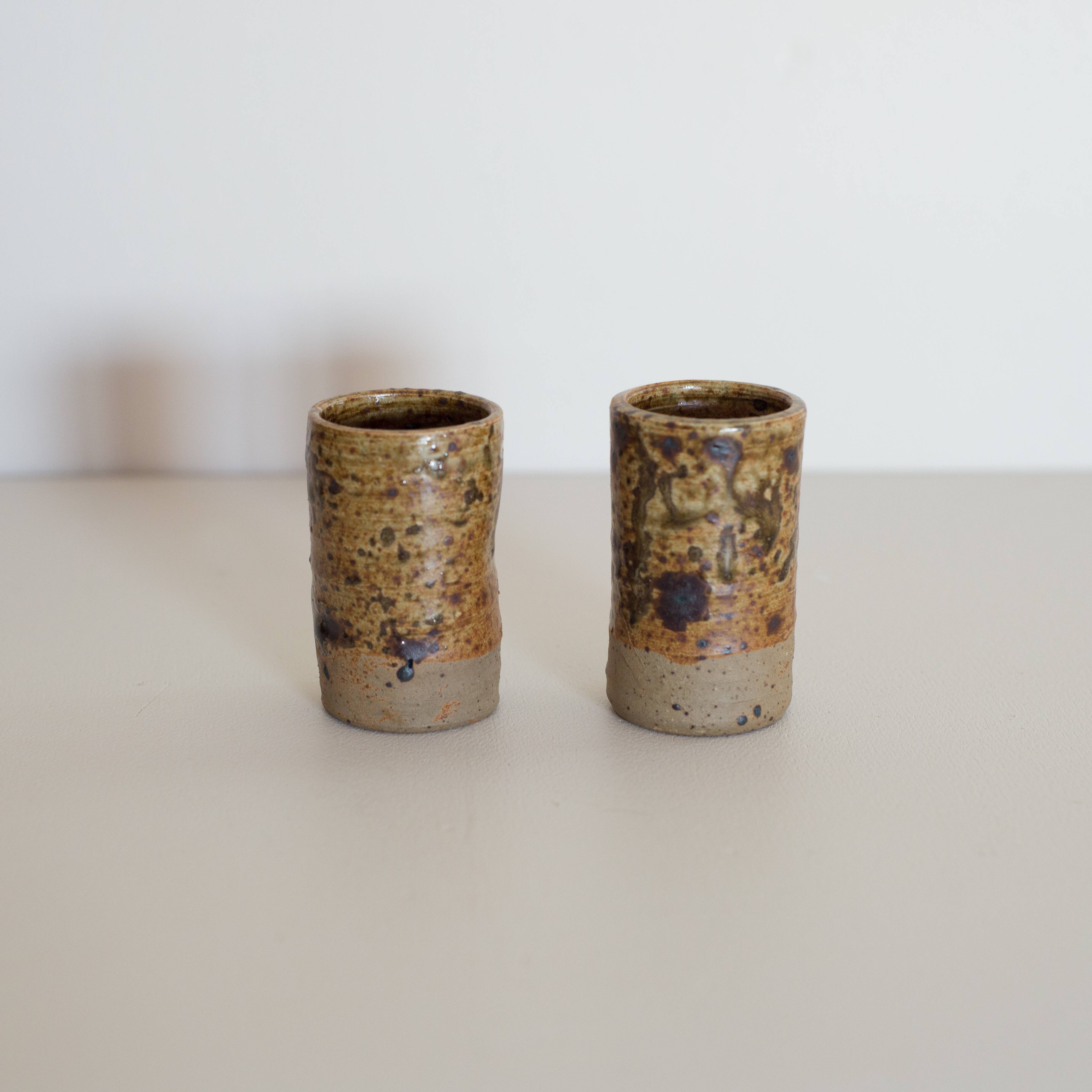 Lot de 9 verres à liqueur ou shot en grès pyrité