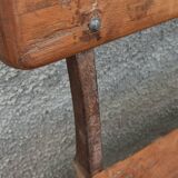 Old wooden bench with cast iron base