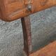 Old wooden bench with cast iron base
