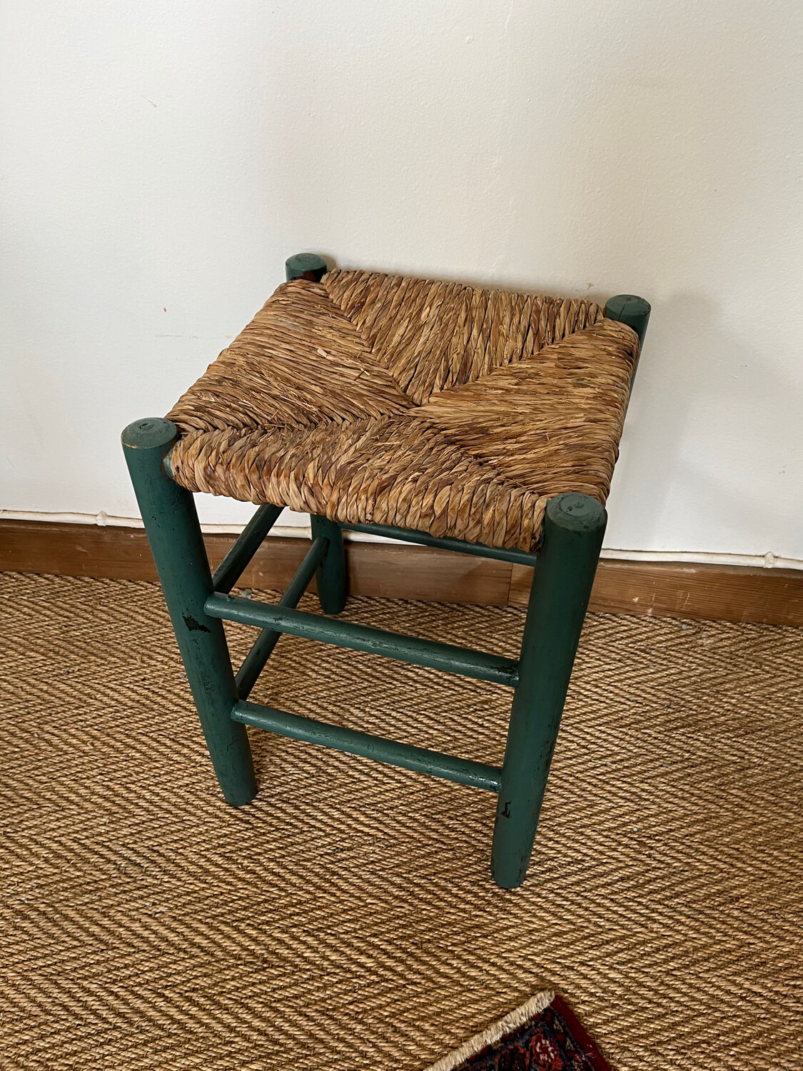 Vintage stool in green patinated wood and straw