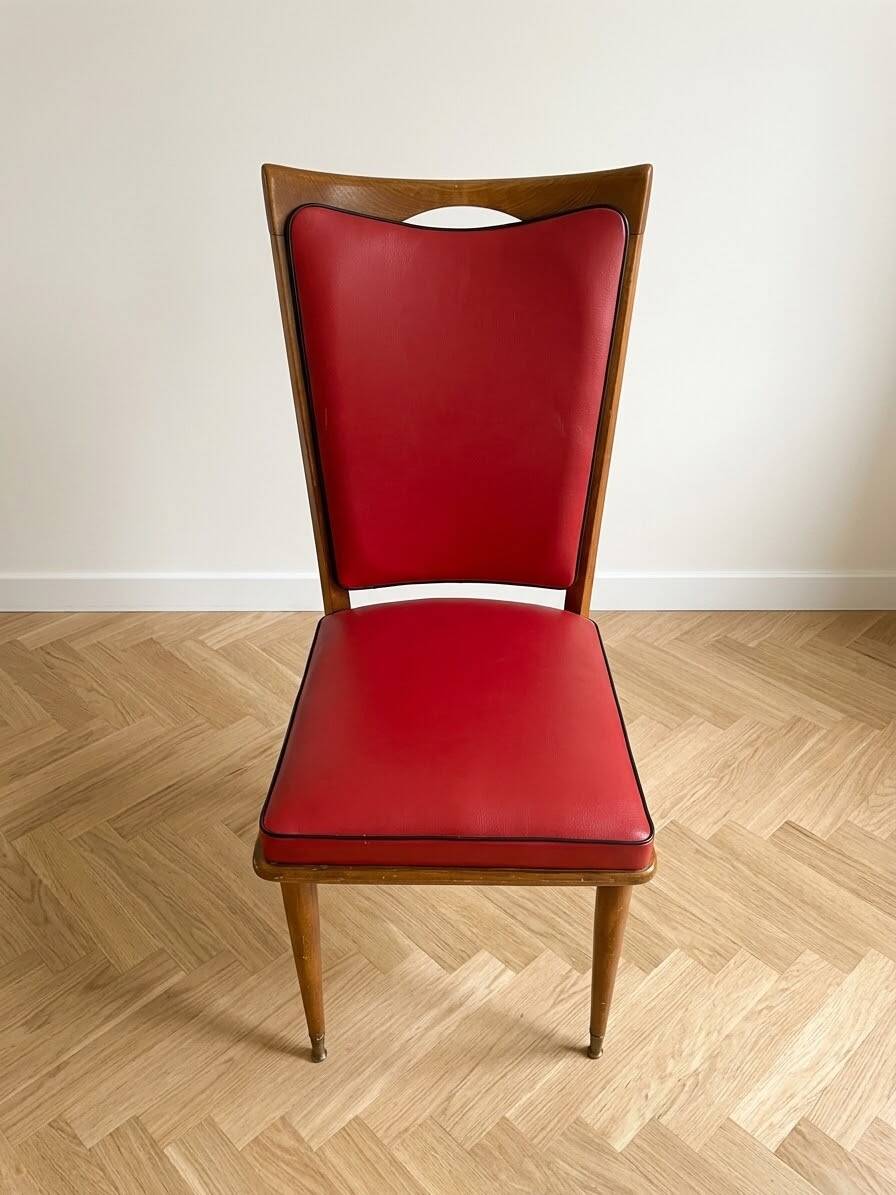 Set of 6 vintage wooden chairs with red faux leather in retro style.