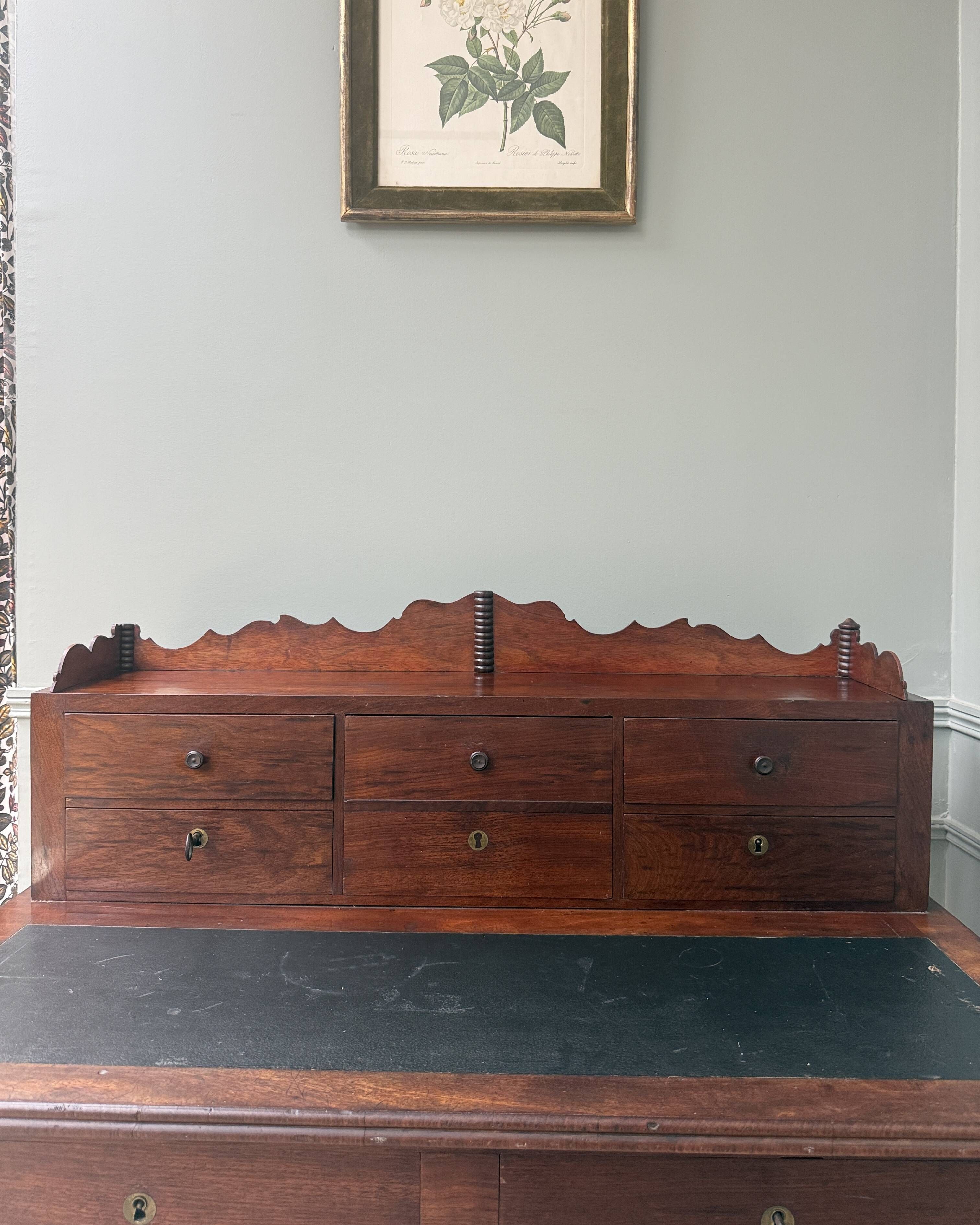 Antique mahogany graduated desk