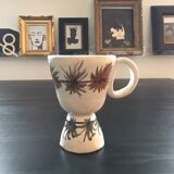 Footed cup with signed decoration