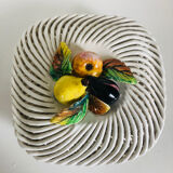 Covered basket in woven ceramic and fruit slip.