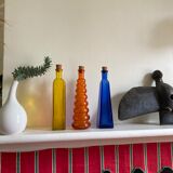 Trio of bottles 1970 color orange yellow and blue geometric shape