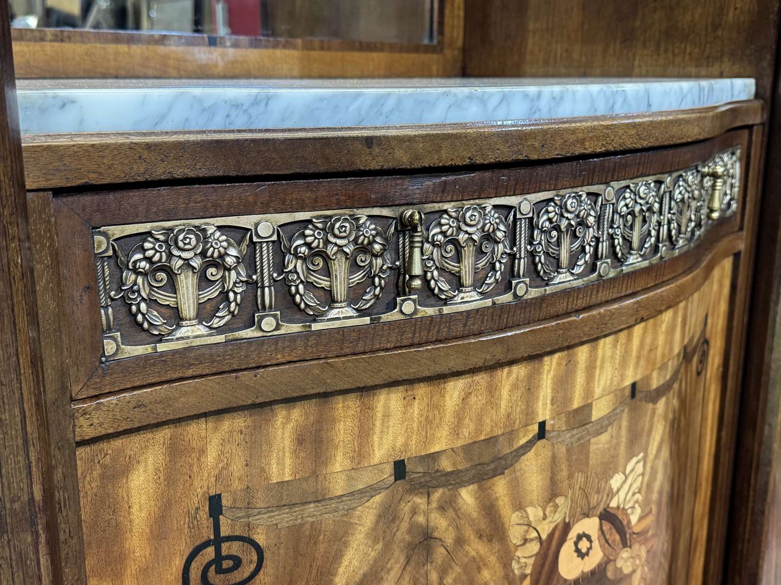 Art Deco buffet in mahogany, oak, and marble top.