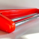 Orange towel rack by Syla from the 70s