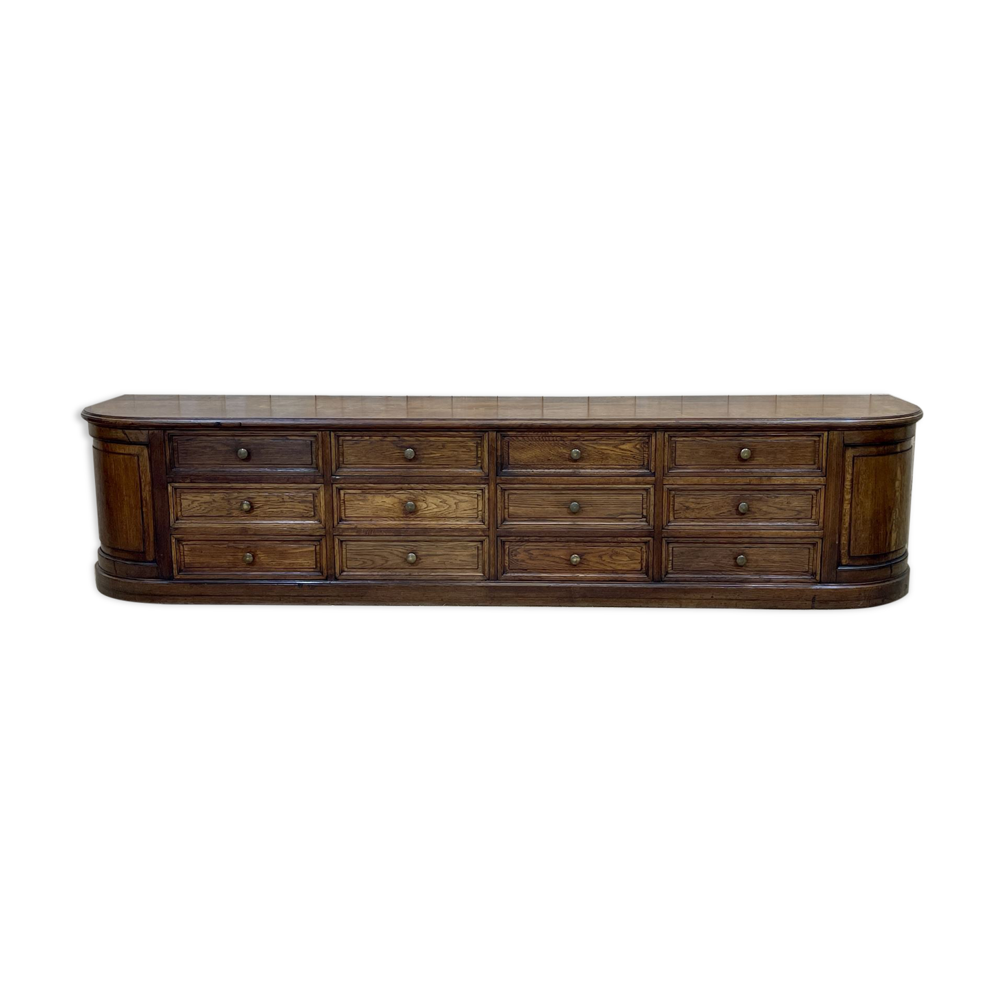 Long low oak countertop with 12 drawers - early XXth