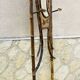 Bamboo coat rack from the 19th century, mirror in the shape of a crescent moon.