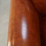 Fauteuil ancien en peau de mouton entièrement restauré