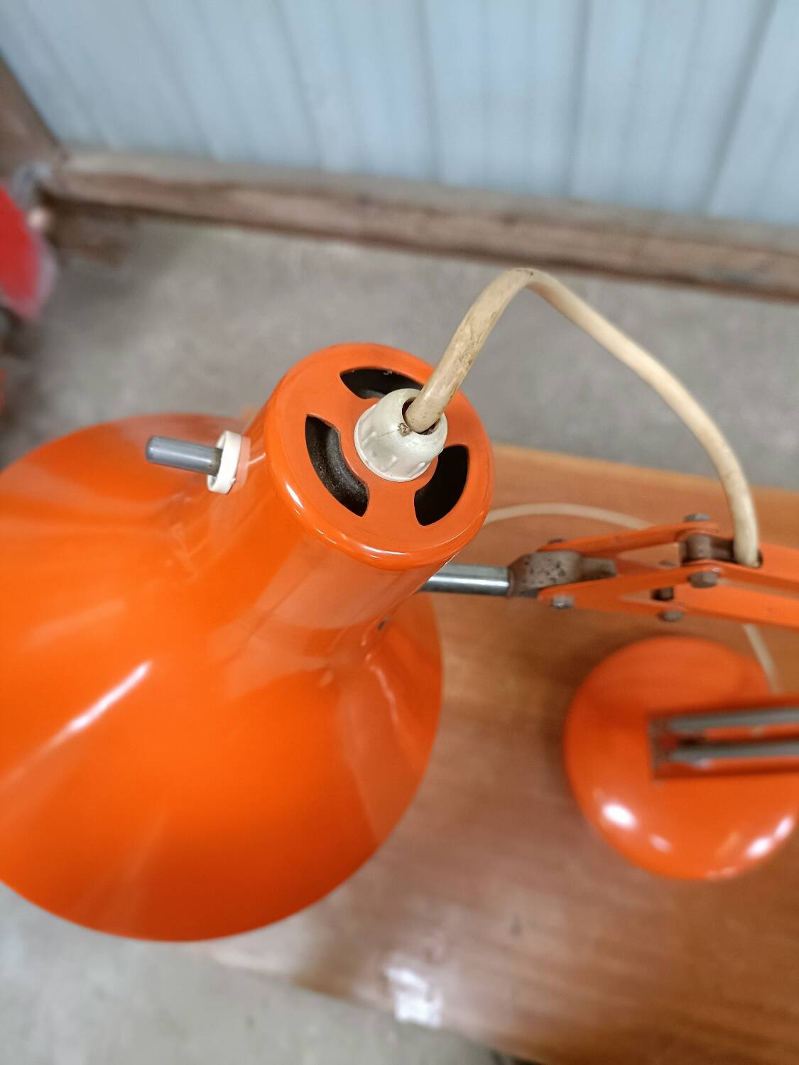 Luxo L4 vintage orange lamp with foot