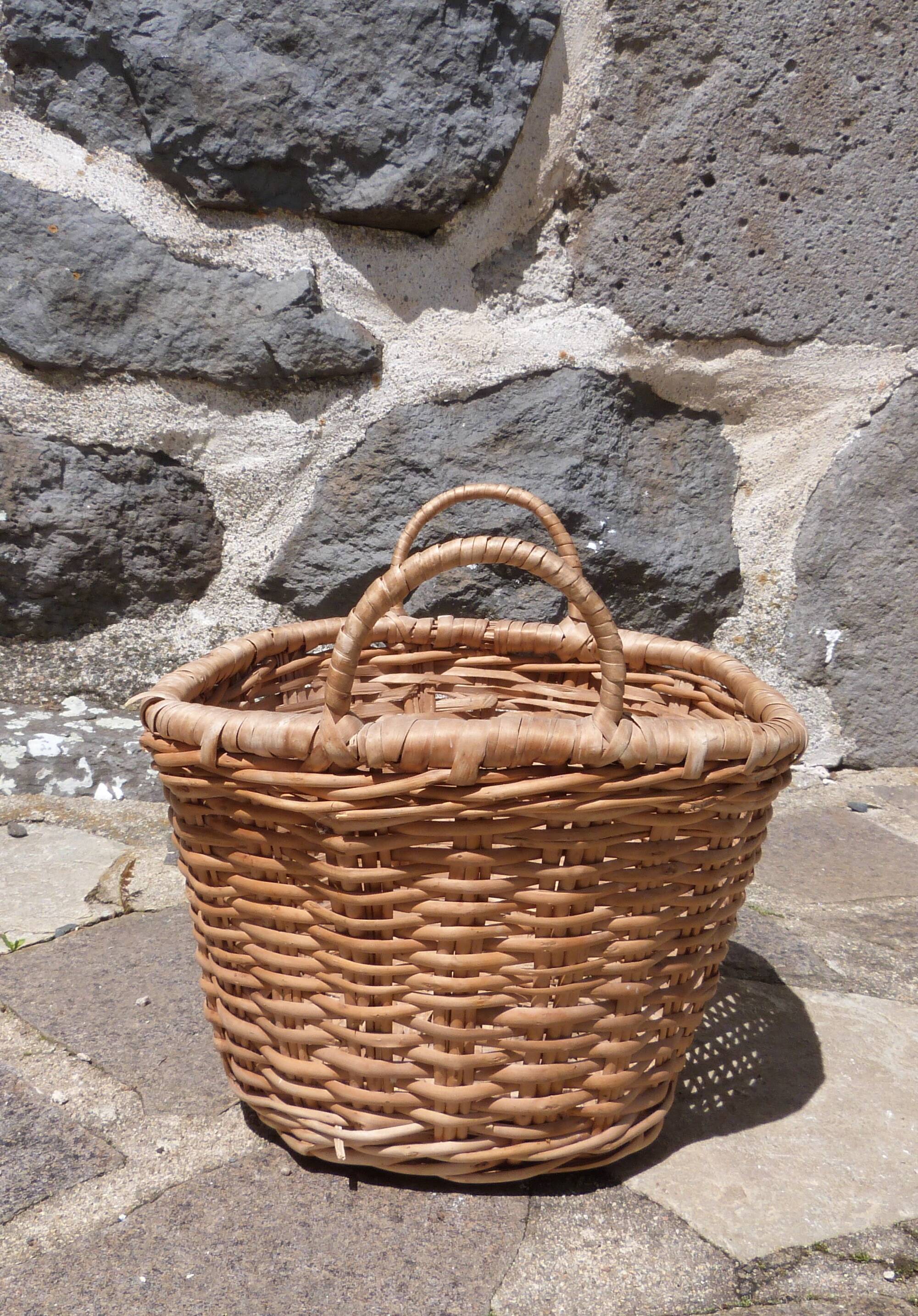 Small wicker basket with handles
